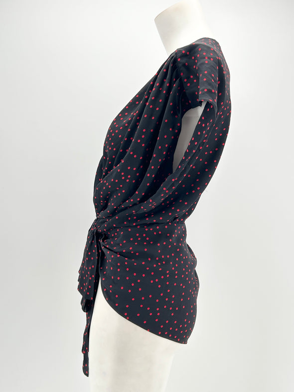 Blouse en soie à pois rouges