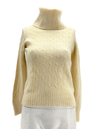 Pull beige à col roulé en cachemire