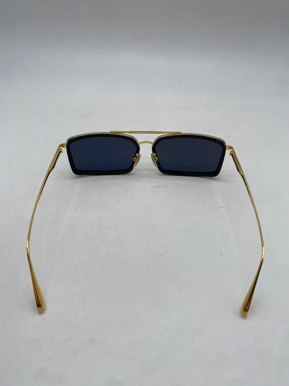 Lunettes de soleil noires et dorées