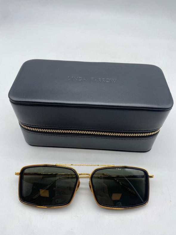 Lunettes de soleil noires et dorées