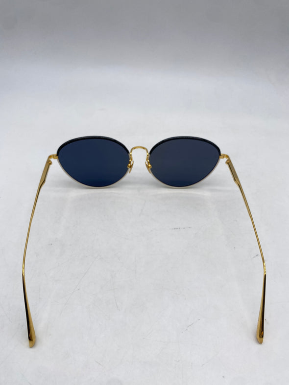 Lunettes de soleil blanches et dorées