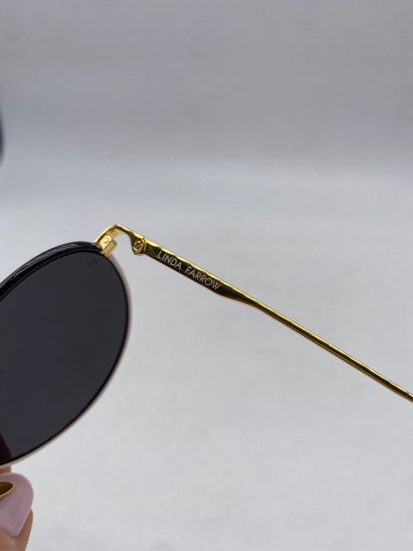 Lunettes de soleil blanches et dorées