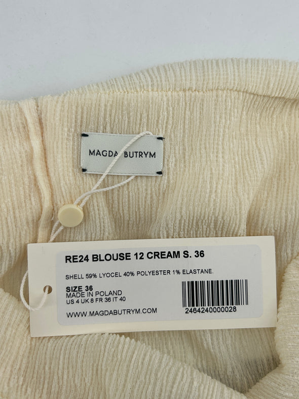 Top court beige à dos nu