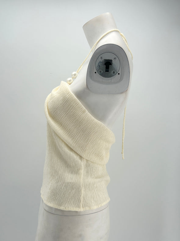 Top court beige à dos nu