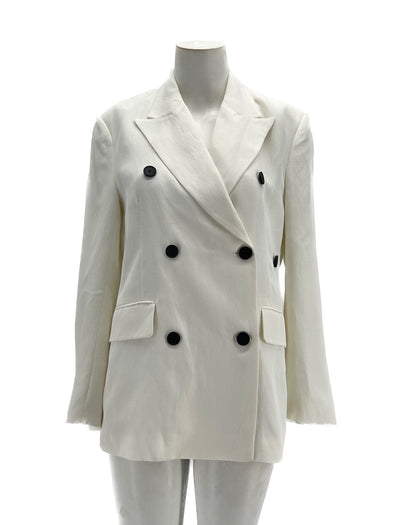 Veste de tailleur blanc à boutons noirs