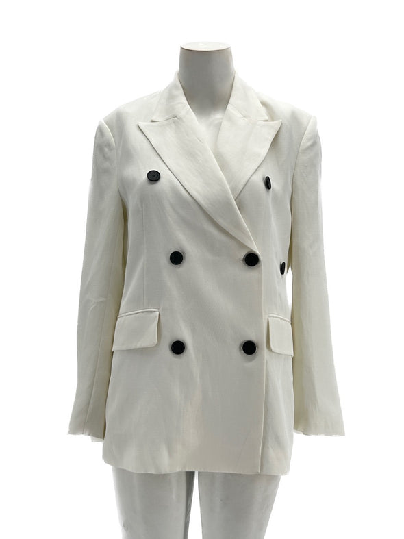 Veste de tailleur blanc à boutons noirs
