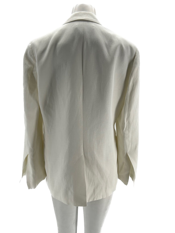 Veste de tailleur blanc à boutons noirs