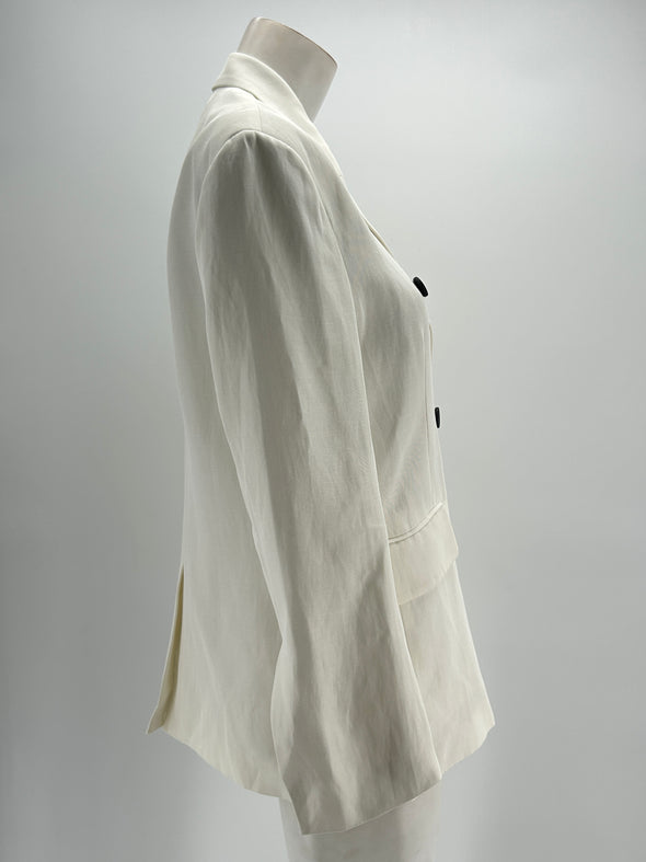 Veste de tailleur blanc à boutons noirs