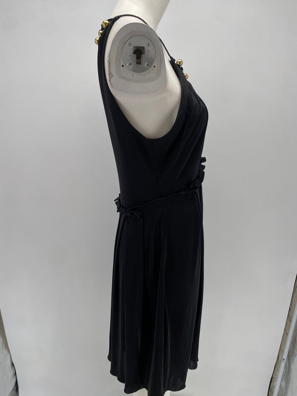 Robe noire à boules dorées