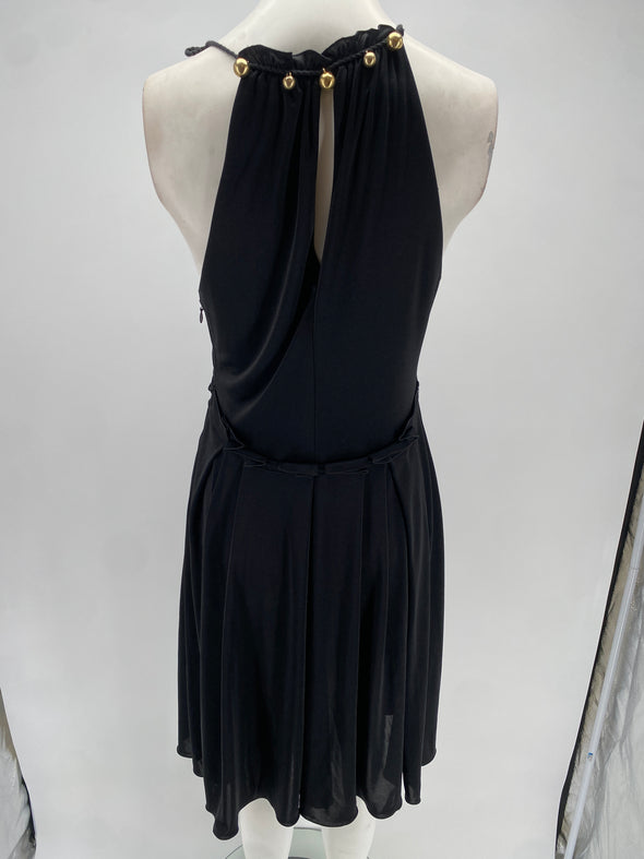 Robe noire à boules dorées