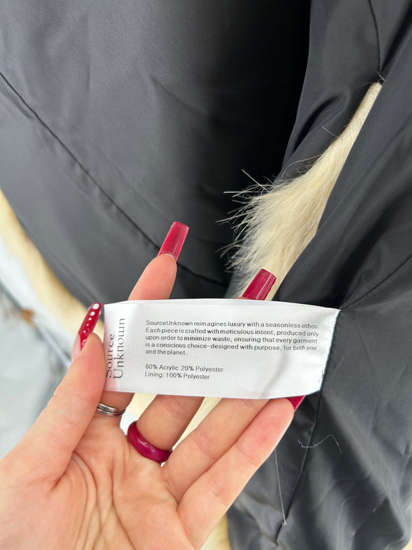 Manteau en fausse fourrure