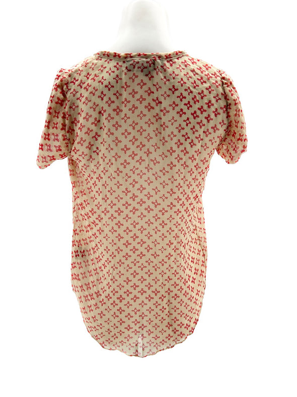 Top beige à motif rouge