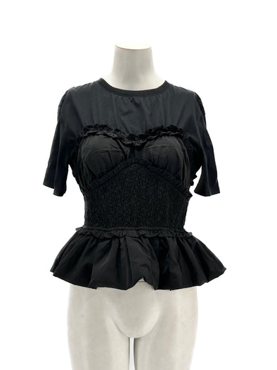 Top noir à volants