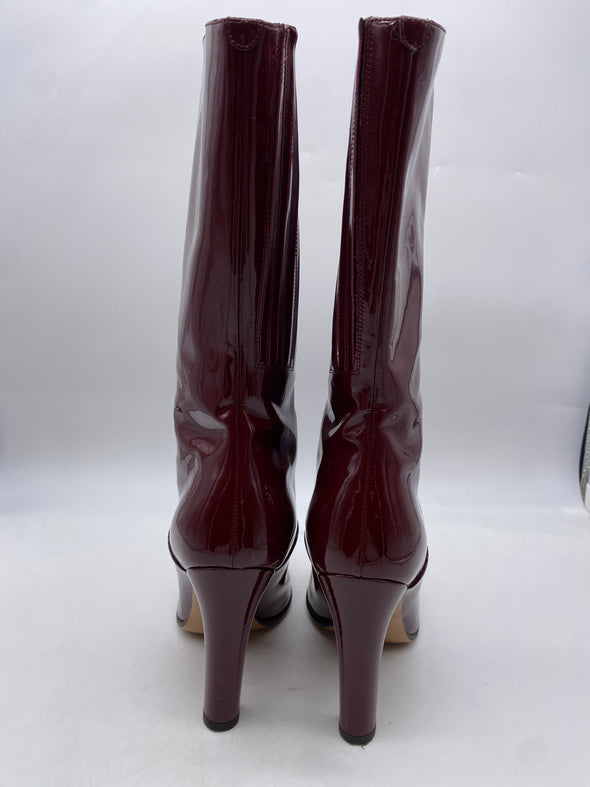 Bottes à talons rouges en cuir verni