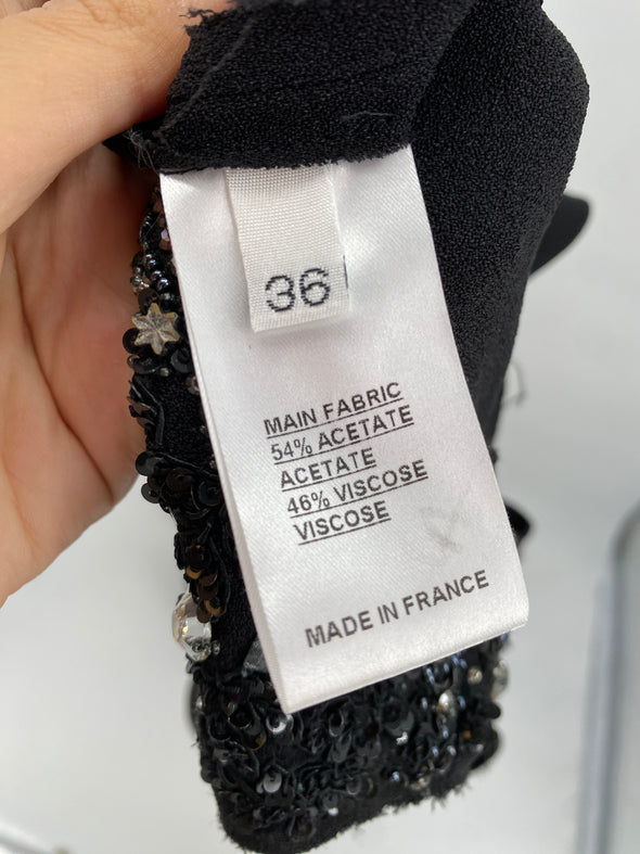 Robe noire avec strass sans manches