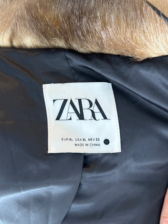 Manteau en fausse fourrure