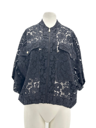 Veste en broderie anglaise noire