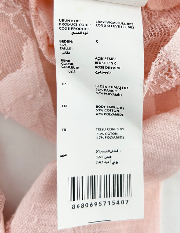 Top rose transparent à dentelle