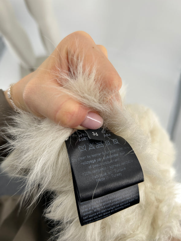 Manteau en peau lainée