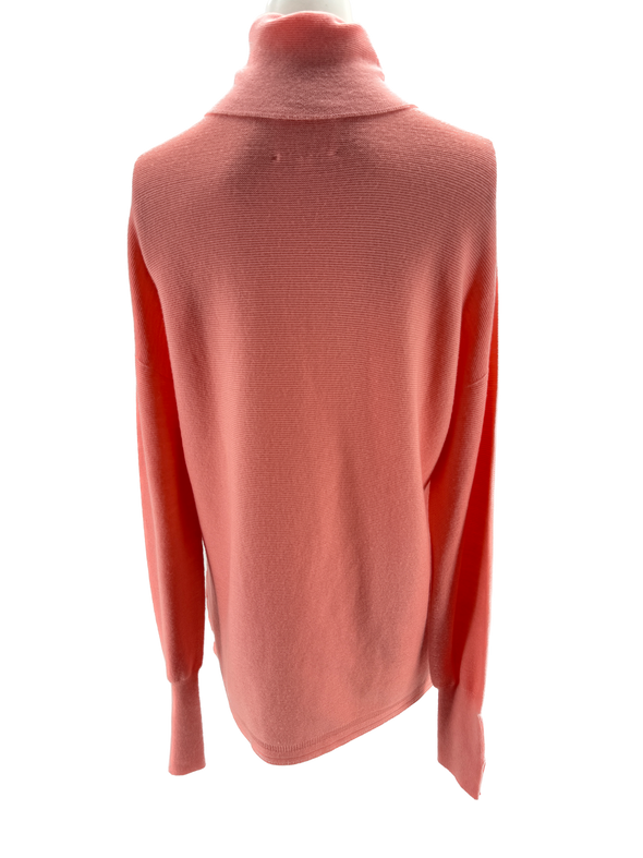 Pull à col roulé rose