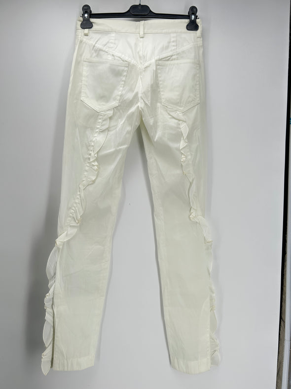 Pantalon blanc avec volants sur les côtés