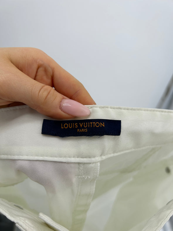 Pantalon blanc avec volants sur les côtés