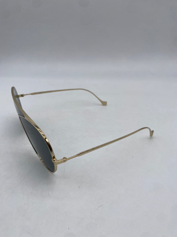 Lunettes de soleil dorées