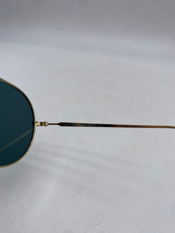 Lunettes de soleil dorées