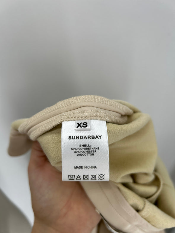 Jupe beige en similicuir