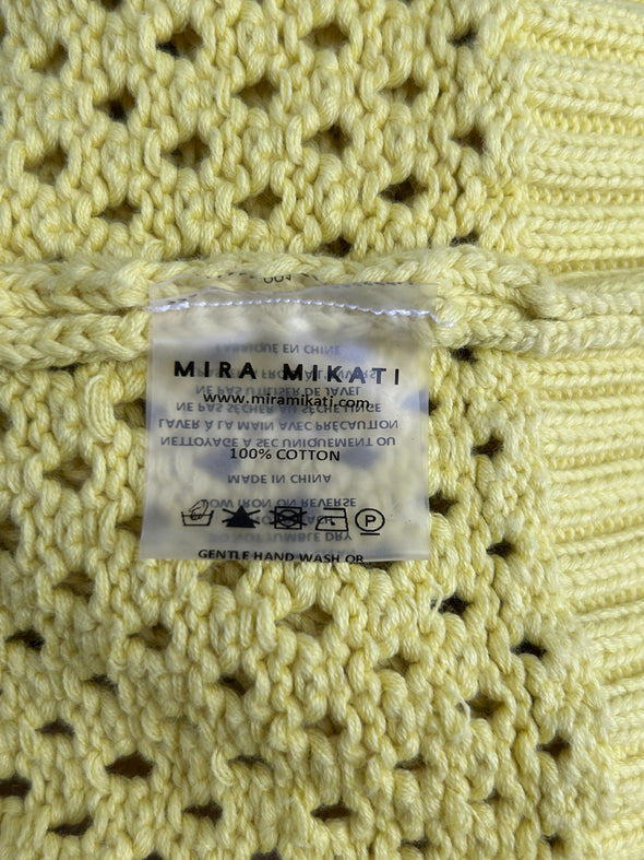 Cardigan en crochet jaune