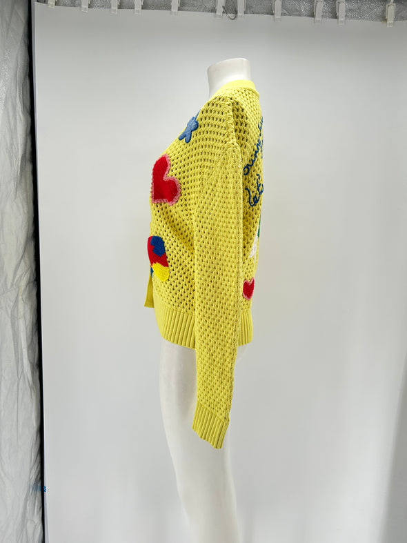 Cardigan en crochet jaune