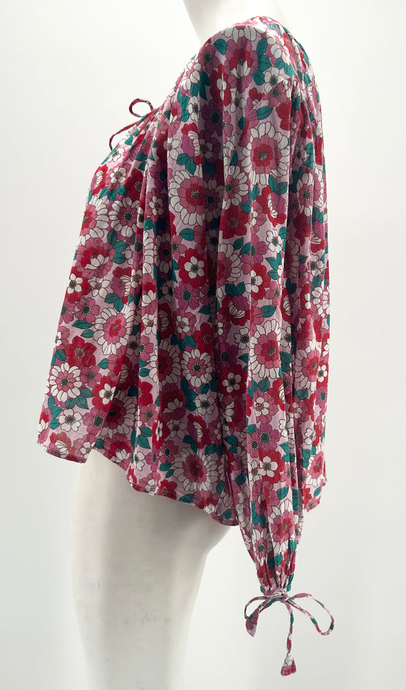 Blouse rose à fleurs