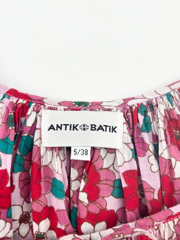 Blouse rose à fleurs