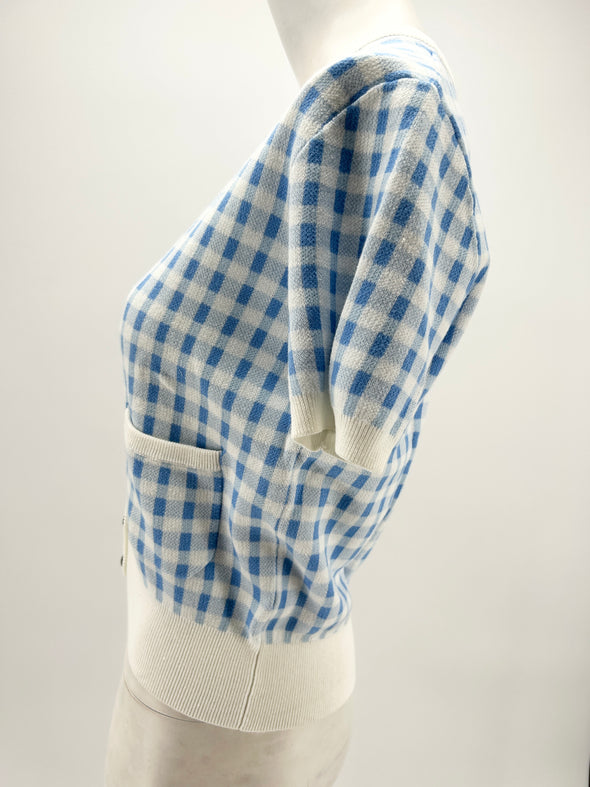 Cardigan blanc à carreaux bleus