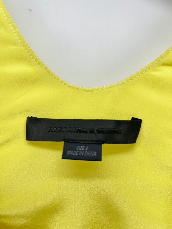 Robe jaune à découpes