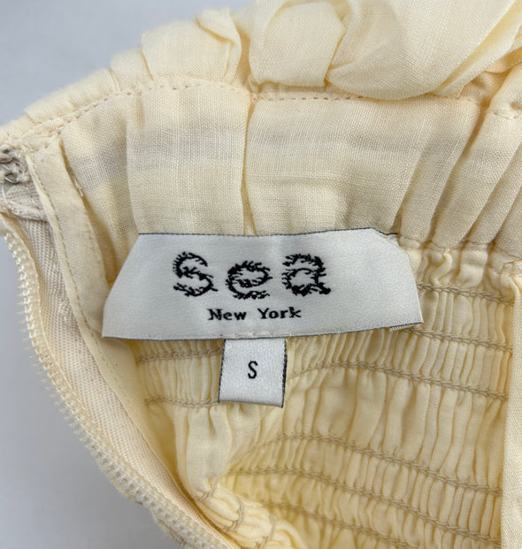 Top plissé beige sans manches