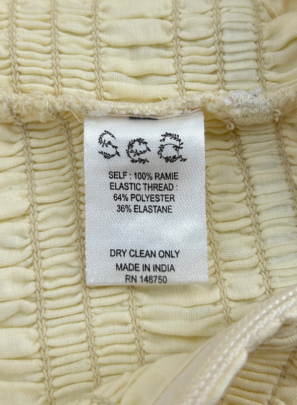 Top plissé beige sans manches