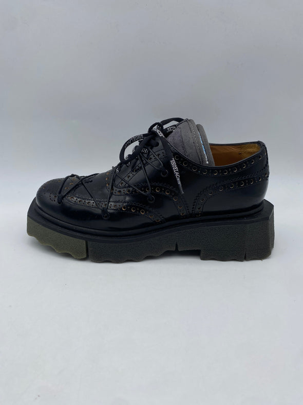 Richelieu Oxford en cuir verni