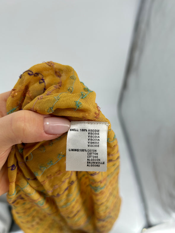 Blouse moutarde avec strass colorés