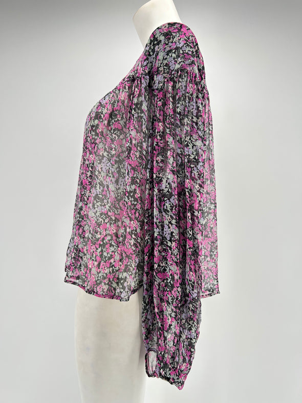 Blouse violette avec imprimés floraux