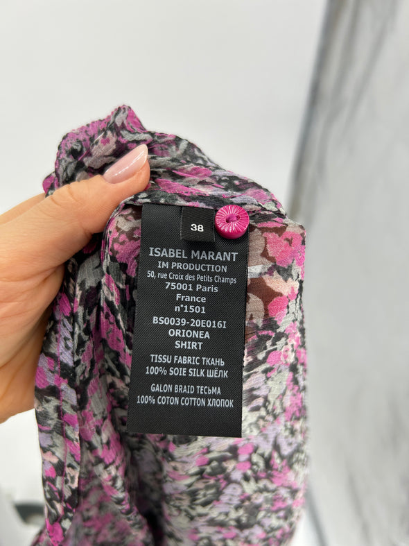 Blouse violette avec imprimés floraux