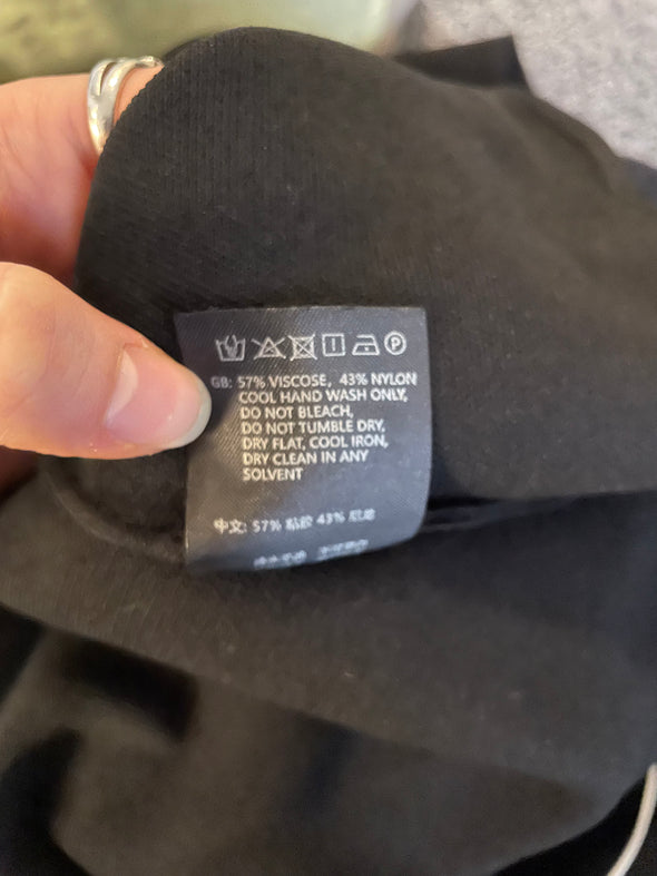 Top avec col torsadé