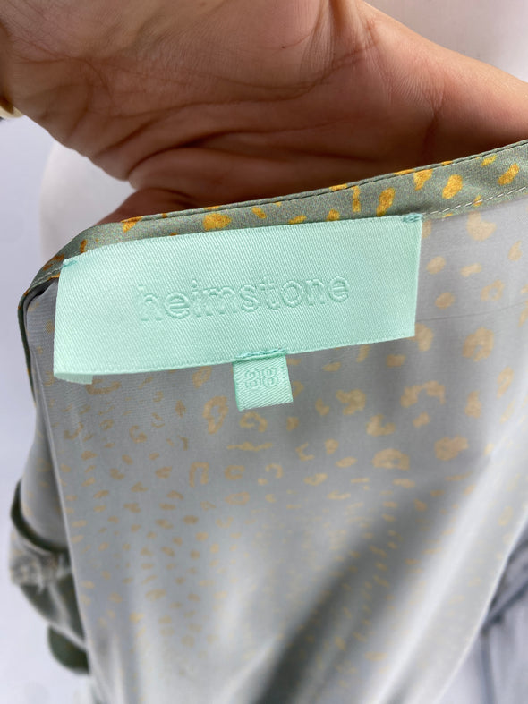 Robe verte à pois dorés