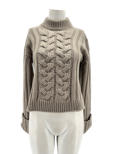 Pull beige à col roulé à torsades