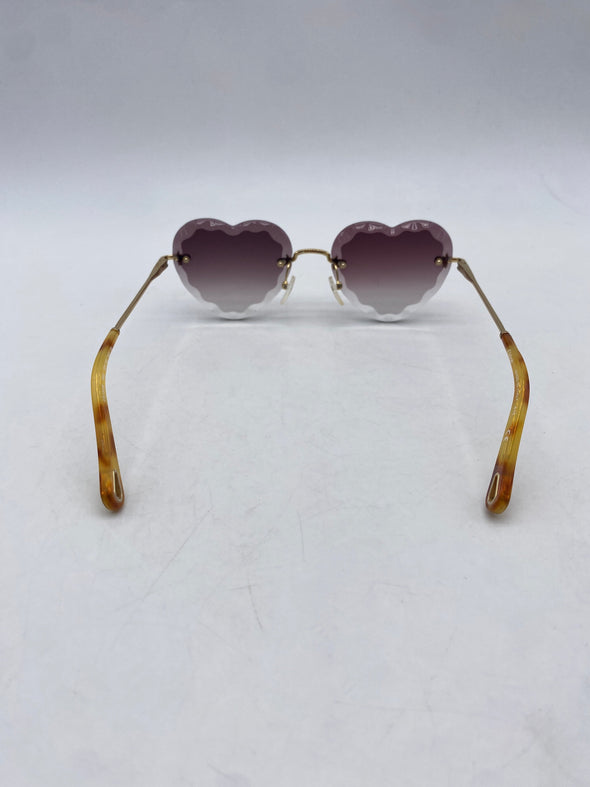 Lunettes de soleil en forme de coeurs