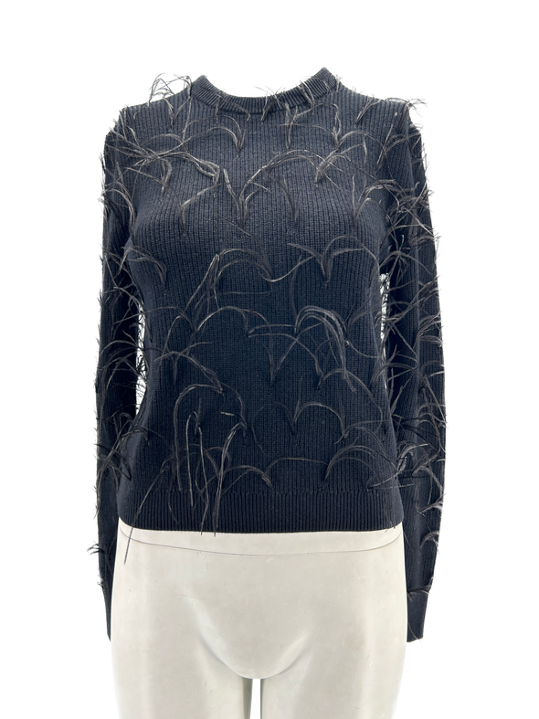 Pull noir à plumes