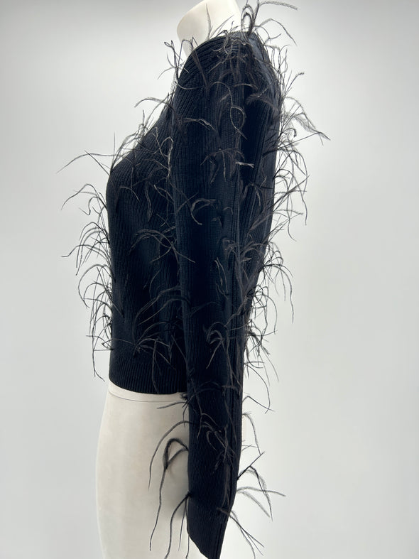 Pull noir à plumes