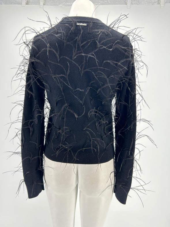 Pull noir à plumes