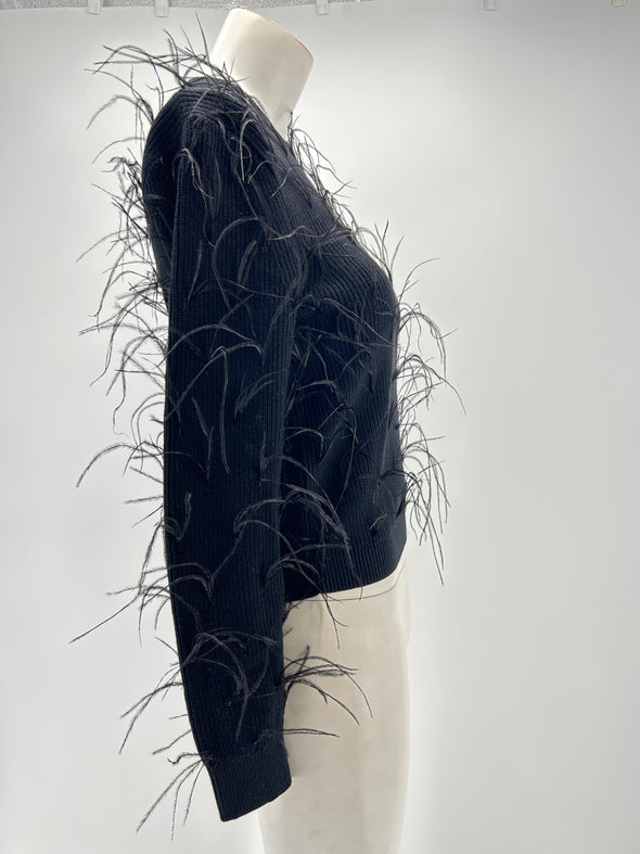 Pull noir à plumes