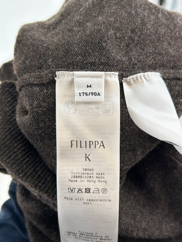 Pull col roulé en laine